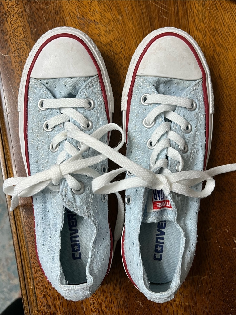 Converse Light Blue Low-Top Sneakers with White Laces and Red Trim